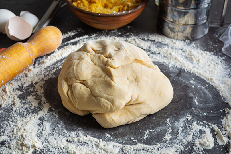 Homemade making dough of pizza, pierogi. Preparation dough for cooking Testo za 5 minuta